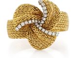 an 18k yellow gold and diamond knot ring, by van cleef