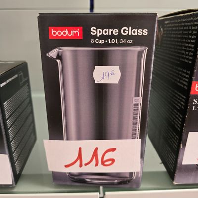 three boxes of glass on the shelf in the store