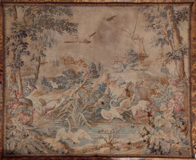 an image of a tapestry hanging on a wall in a room