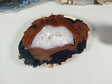 a picture of a slice of agate on a table