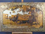 a picture of a painting on a easel in a room