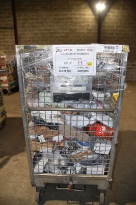 a metal cart with many items in it in a warehouse