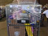 a cart full of items in a warehouse with a man walking by