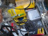 a box full of assorted electrical tools and wires