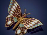 une image représentant une broche en forme de papillon aux ailes bleues et dorées