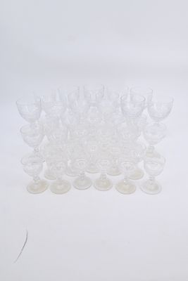 a lot of empty wine glasses sitting on a table