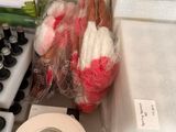 a toilet that has a roll of toilet paper on the top of it