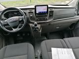 a picture of a car dashboard with a tablet on it