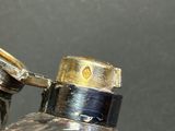 a close up of a metal object on a table