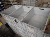 boxes are stacked on top of each other in a warehouse