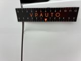 a measuring tape on the side of a white car