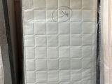 a lot of mattresses in the store for sale