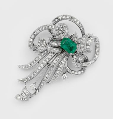 an emerald and diamond broochle