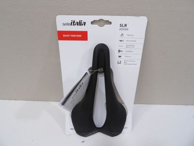 a black pair of scissors on a white card