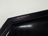a close up of a black sink in a bathroom