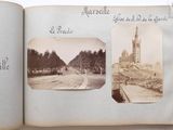 an open book with a picture of a church and a street