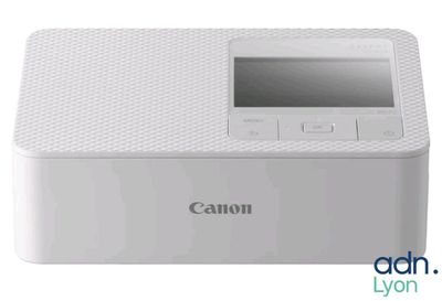 L'imprimante photo Canon est blanche et dispose d'un écran numérique.