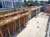 a construction site with scaffolding and scaffolding on the side of the building