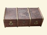 three suitcases sitting on top of each other on a table