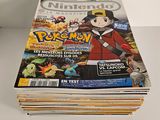 a stack of pokemon magazine covers on a table