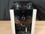 an image of a coffee machine on a wooden table