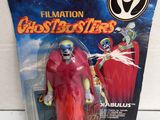 a close up of a toy figure in a package on a table