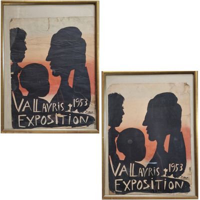 two framed posters of a couple of people holding a soccer ball