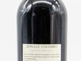 a bottle of wine that is sitting on a table