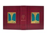 an image of a red book with a picture of a tree on it