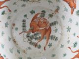 a bowl that has a picture of a deer on it