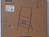 a cardboard box with a picture of a folding chair on it