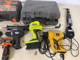 many tools that are laying out on a table