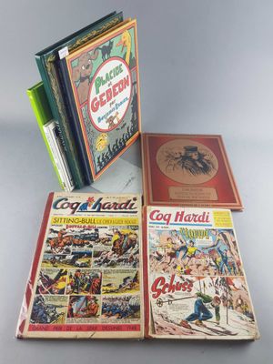 three comics are stacked on top of each other on a table