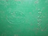 a close up of a green container with a logo on it