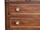 an image of a wooden chest of drawers with marble top