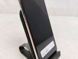 a cell phone that is sitting on a stand
