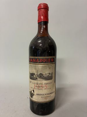 a bottle of wine that is sitting on a table