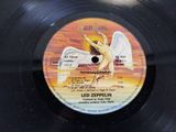an image of a vinyl record with a picture of an angel on it