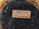 a close up of a vase with a label on it