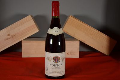 a bottle of wine that is sitting on a table