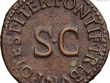 an old copper coin with the word sc on it