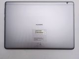 a close up of the back of a silver laptop with a sticker on it