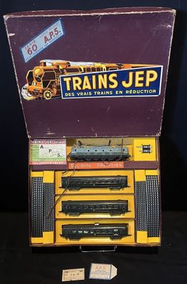 une image représentant une boîte contenant un circuit de train