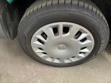a close up of a tire on a car ' s rim