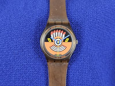 a watch that has a picture of a clown on it