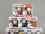 a lot of different batman pop vinyl figures in the box