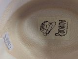 a close up of a hat with a label on it