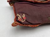 a small pouch with a floral design on it