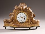 a clock that is sitting on top of a table