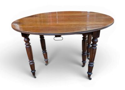 a wooden table with two legs and a wooden table top